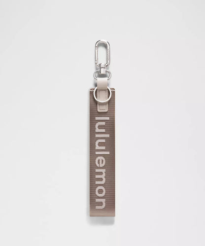 Lululemon Never Lost Keychain